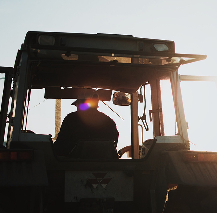 Farmer In Tractor